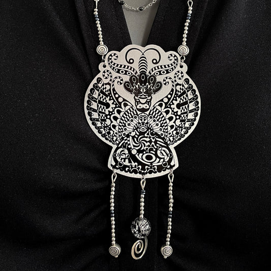 Collier Saturnia noir et blanc